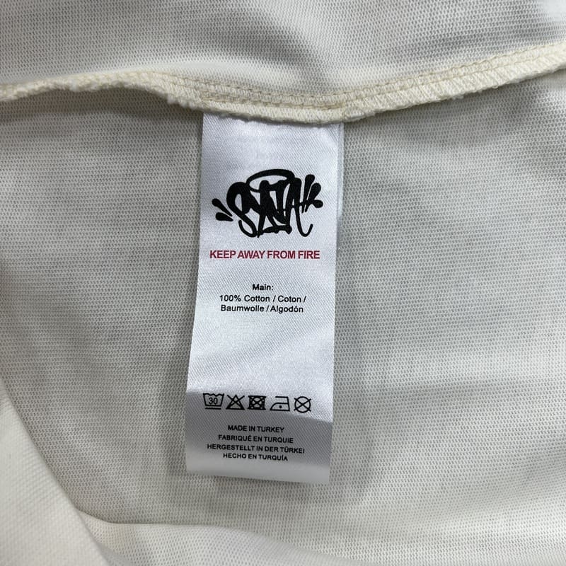 Camiseta Syna World College - HYPER LIST