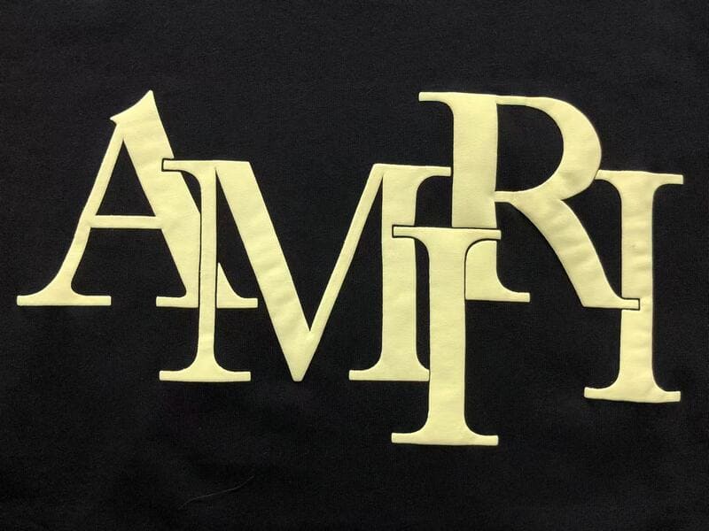 T-shirt à logo décalé Amiri