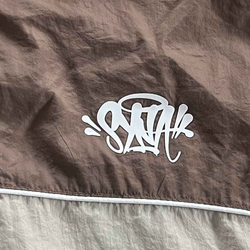 Conjunto Synaworld 'Syna Logo' Shell Marrom/Bege - HYPER LIST