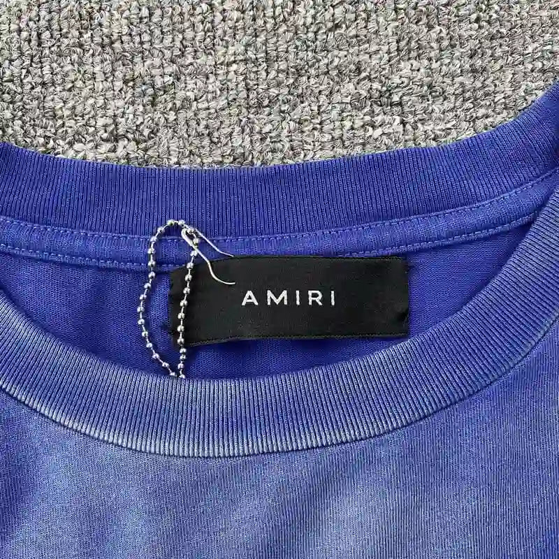 Livraison rapide – T-shirt bleu universitaire vintage Amiri
