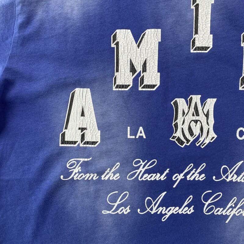 Livraison rapide – T-shirt bleu universitaire vintage Amiri