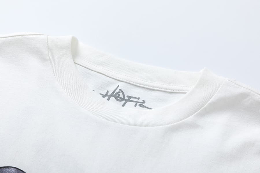 Camiseta Travis Scott x KAWS - HYPER LIST