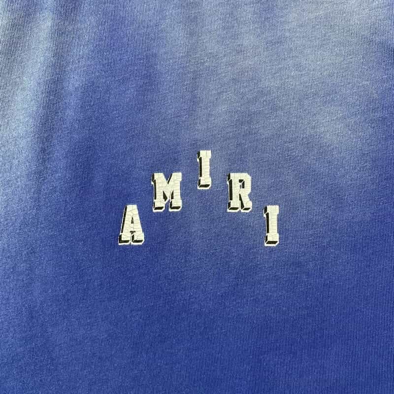 Livraison rapide – T-shirt bleu universitaire vintage Amiri