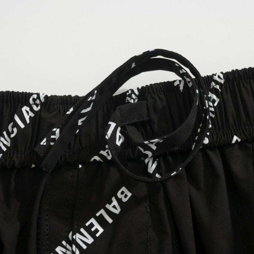 Shorts Balenciaga Allover Logo Print BL044