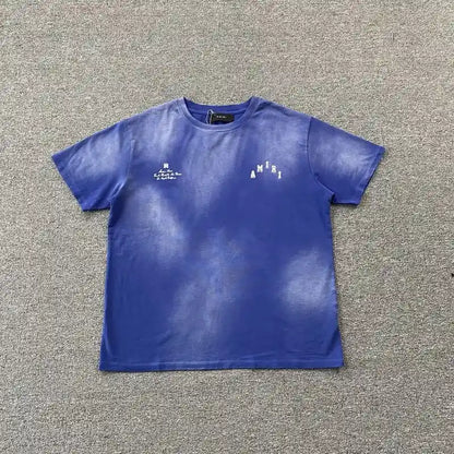 Livraison rapide – T-shirt bleu universitaire vintage Amiri 