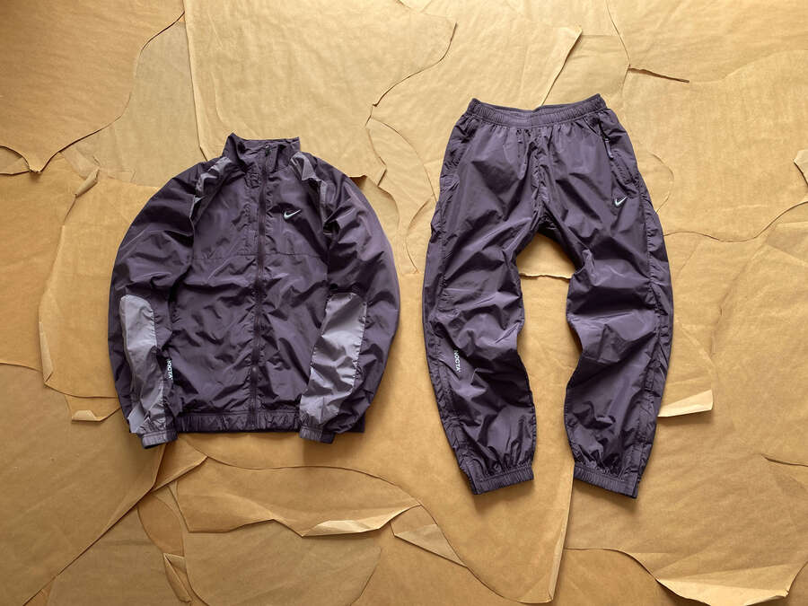 Conjunto Nike x NOCTA Cobalt Track Dark Raisin - HYPER LIST