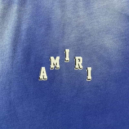 Livraison rapide – T-shirt bleu universitaire vintage Amiri 