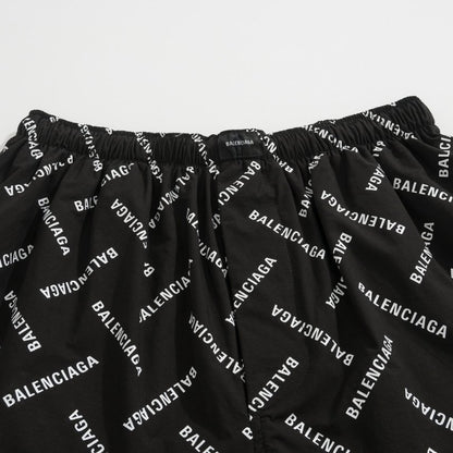 Shorts Balenciaga Allover Logo Print BL044